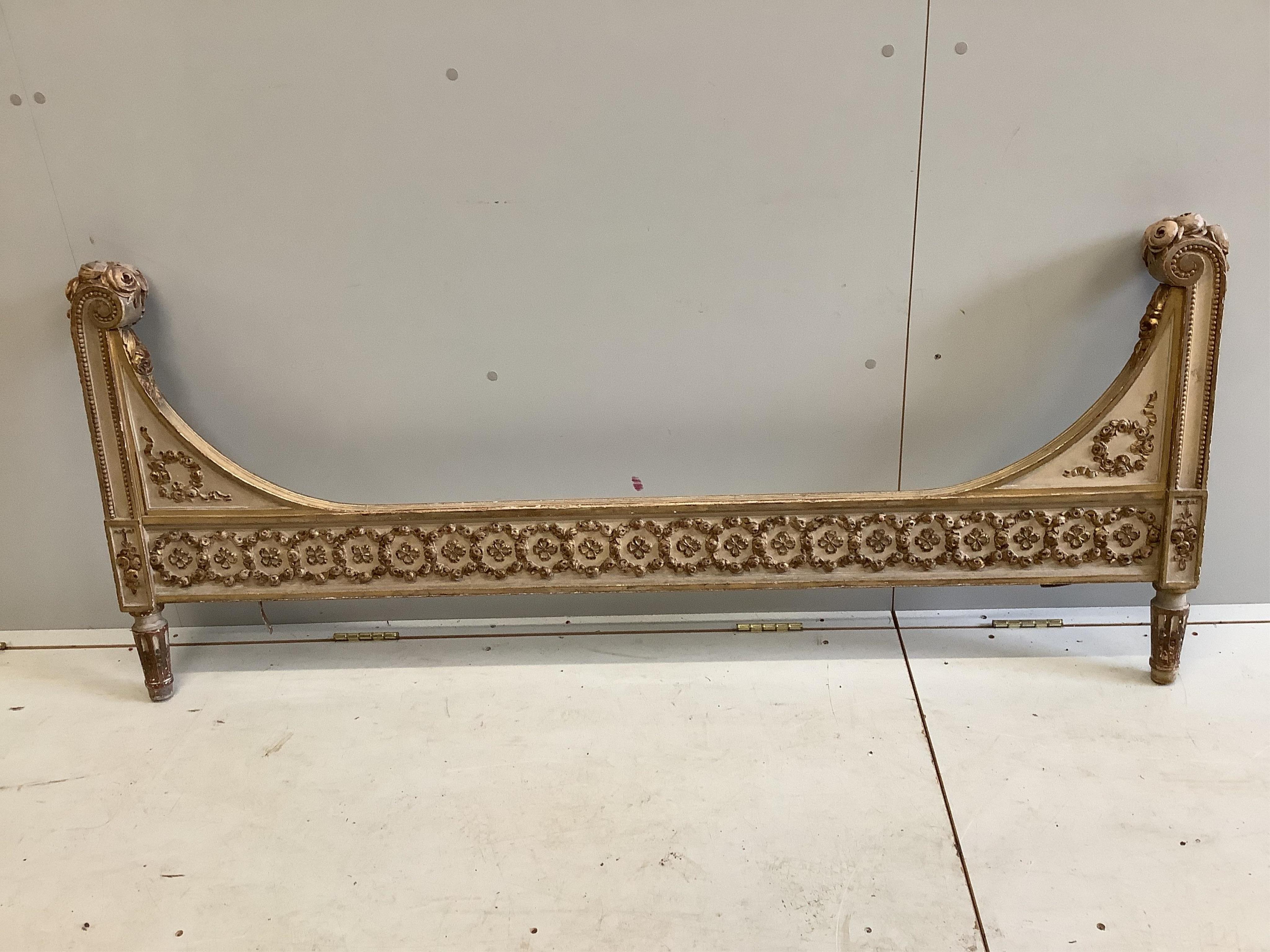 A Louis XV style carved cream and gilt carved wood head and foot bedstead, width 160cm, height 112cm. Condition - good but no side rails